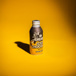 The Big Jimmy Iced Chocolate Milk on a yellow background
